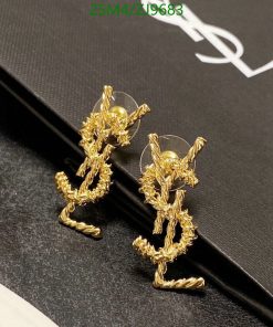 Gold twisted rope bunny earrings on black background.