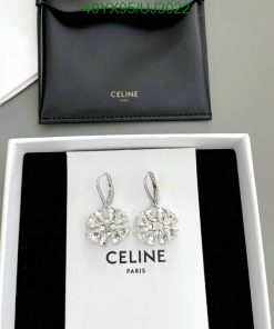 Celine diamond earrings in presentation box.