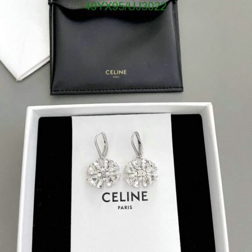 Celine diamond earrings in presentation box.