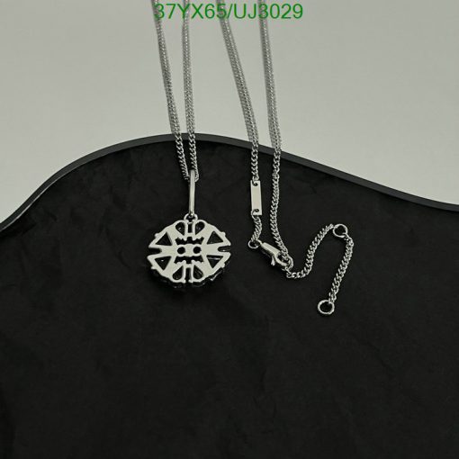 Silver tribal pendant necklace on black background