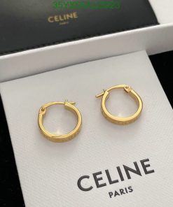 Gold Celine hoop earrings on display.