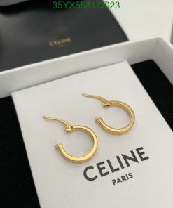 Celine gold hoop earrings in box.