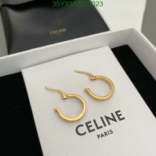 Celine gold hoop earrings in box.