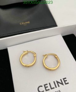 Celine gold hoop earrings in box.