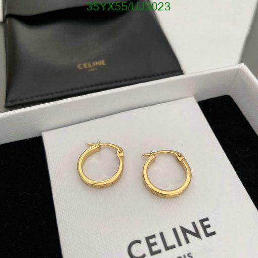 Celine gold hoop earrings in box.