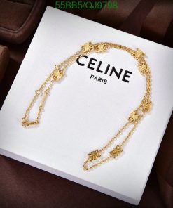 Gold necklace on Celine Paris box