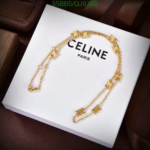 Gold necklace on Celine Paris box