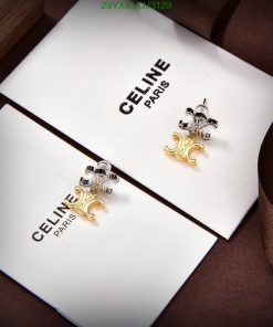 Celine Paris luxury earrings on display card.