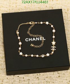 Designer pearl necklace on branded black box.