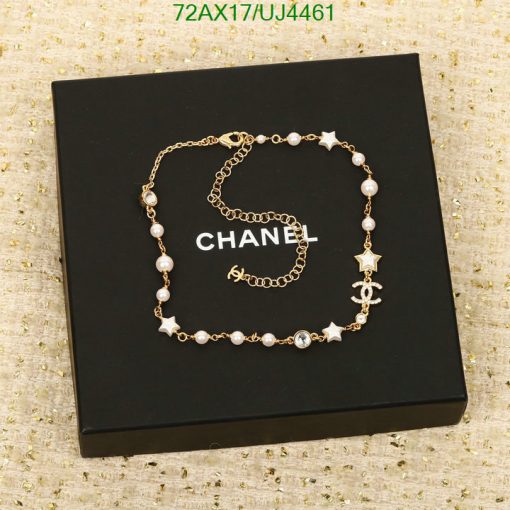 Designer pearl necklace on branded black box.