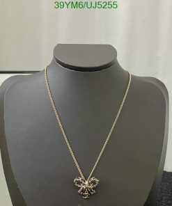 Elegant necklace on mannequin bust display.