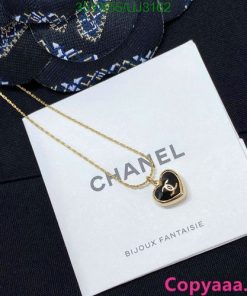 Gold Chanel logo pendant necklace on branded card.