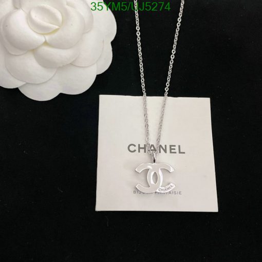 Silver necklace with logo pendant on branded card