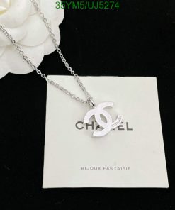 Silver pendant necklace on branded card.