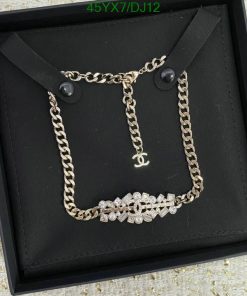 Designer gold-tone necklace in black box