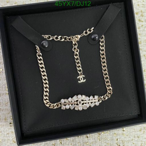 Designer gold-tone necklace in black box