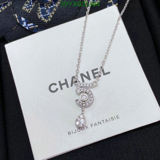 Chanel necklace with number 5 pendant and crystals.