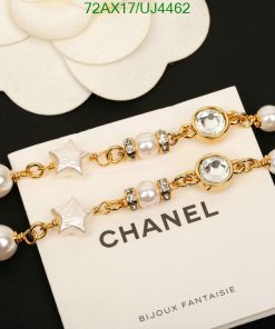 Elegant pearl and crystal gold bracelet on display.