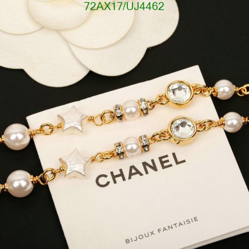 Elegant pearl and crystal gold bracelet on display.