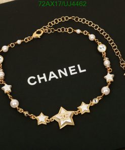 Gold star and pearl designer necklace.