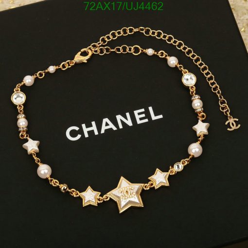 Gold star and pearl designer necklace.