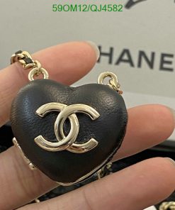 Black heart-shaped keychain with logo.