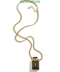 Gold chain necklace with designer perfume bottle pendant.