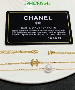 Chanel bracelets with authenticity card displayed on white surface.