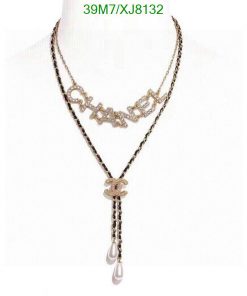 Diamond-encrusted word pendant with floral charm necklace.