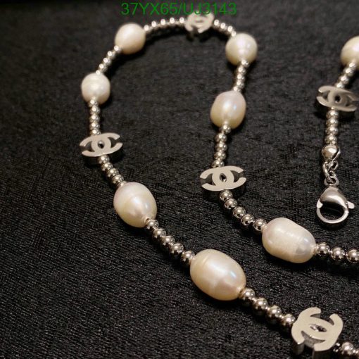 Designer pearl and silver bead necklace.