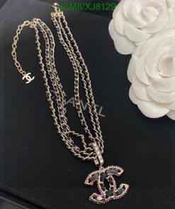 Designer logo pendant necklace with white flowers.