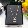 Designer logo pendant necklace in presentation box.