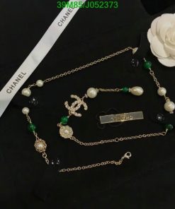 Designer pearl and gemstone gold chain necklaces.