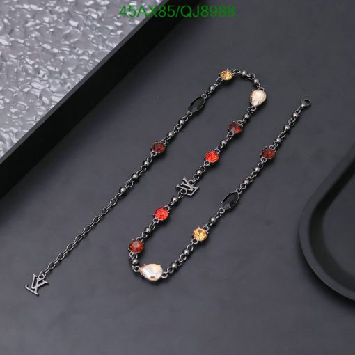 Black chain necklace with colorful gemstone accents.