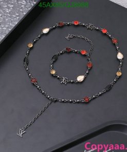 Elegant black chain necklace with red and gold accents.