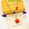 Louis Vuitton necklace with heart pendant and packaging.