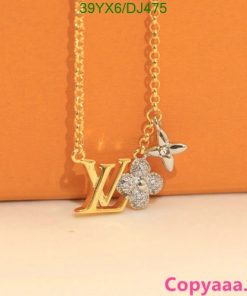 Gold letter pendant necklace with flower charm.