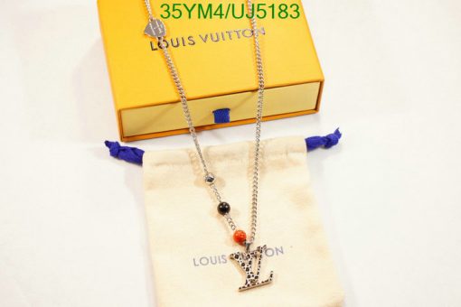 Louis Vuitton necklace with box and pouch display.