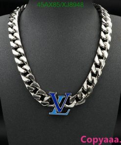 Silver necklace with blue "V" pendant on mannequin.