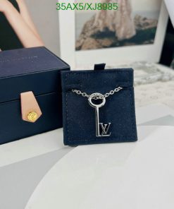 Designer key pendant with brand packaging.