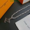 Silver chain necklace on branded packaging.