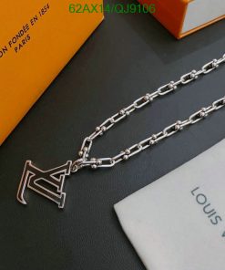 Silver chain necklace on branded packaging.