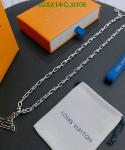 Louis Vuitton silver necklace with brand packaging.