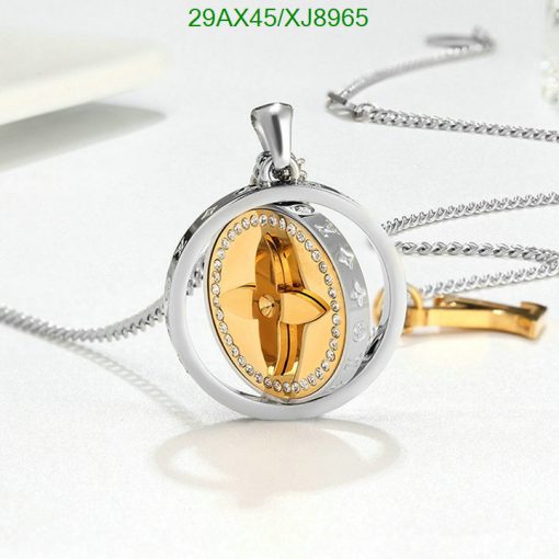 Gold and silver propeller pendant with diamonds, elegant jewelry.