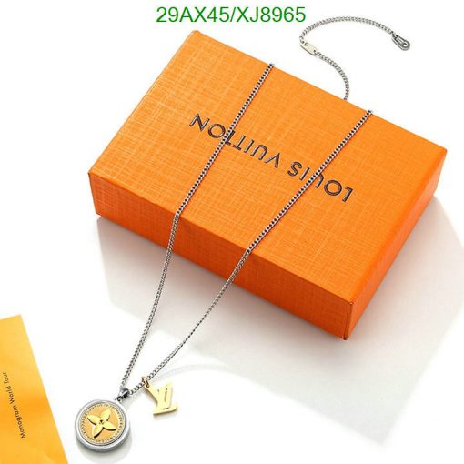 Orange box with silver necklace and pendant.