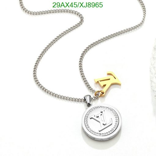 Silver and gold pendant necklace with letter charms.