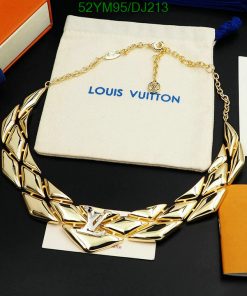 Gold necklace, branded packaging, luxury fashion accessory.