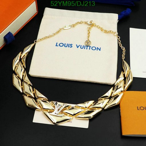 Gold necklace, branded packaging, luxury fashion accessory.