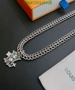 Designer silver chain necklace with logo pendant.