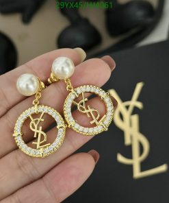 Designer pearl and logo drop earrings.